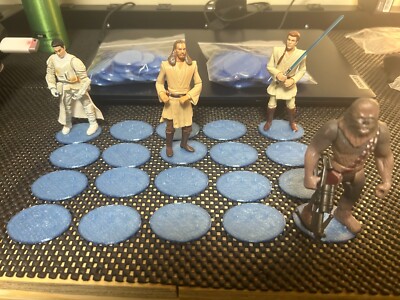 Modern Star Wars action figure stands. QTY 40