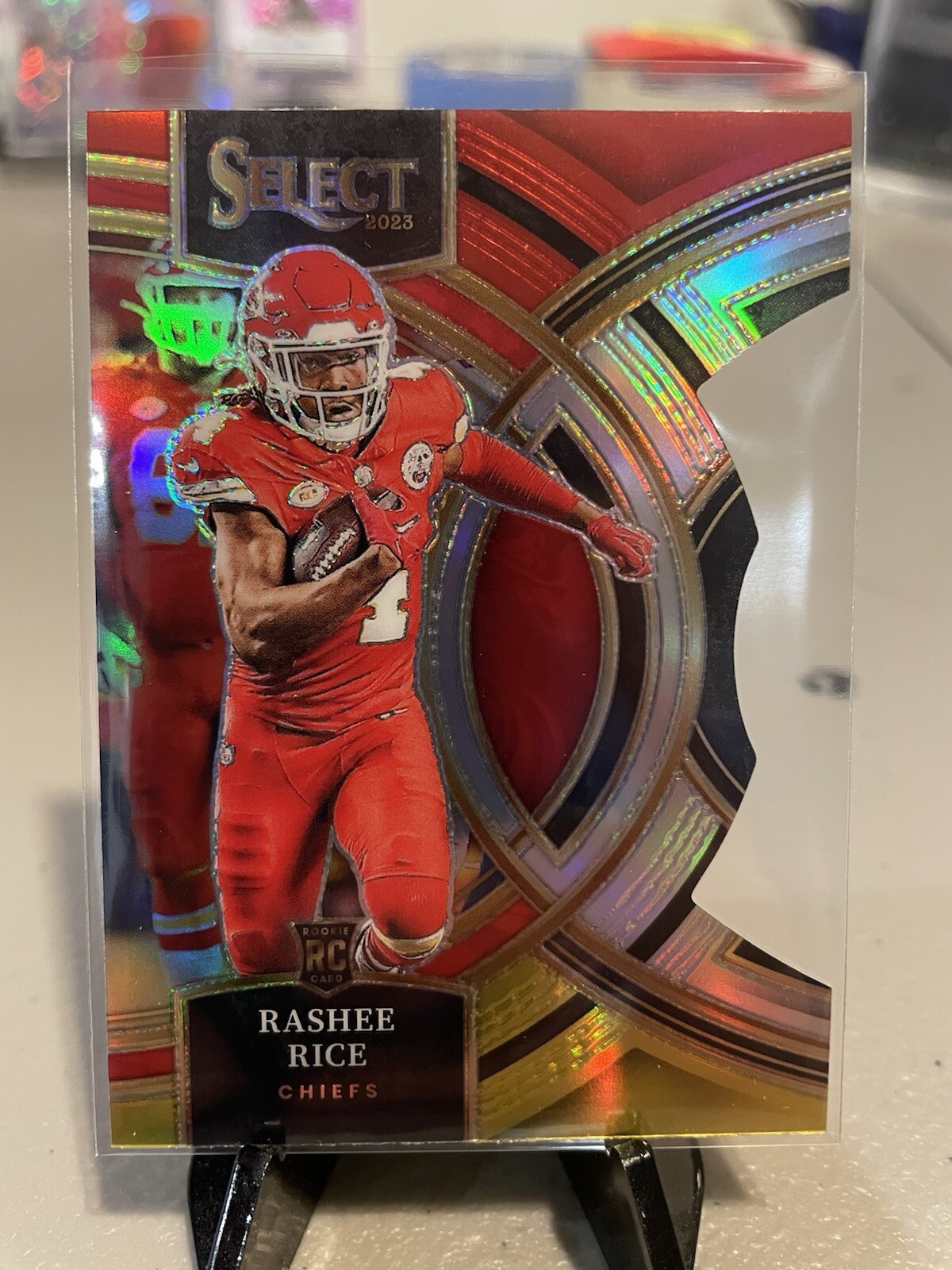 2023 Select Rashee Rice Premier Level Rookie Die-cut Red & Yellow Prizm NM