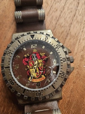 Officially Licensed Harry Potter Slytherin House Crest Watch Broken Face