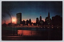 Vintage NYC Midtown Skyline Postcard United Nations Chrysler Building Night
