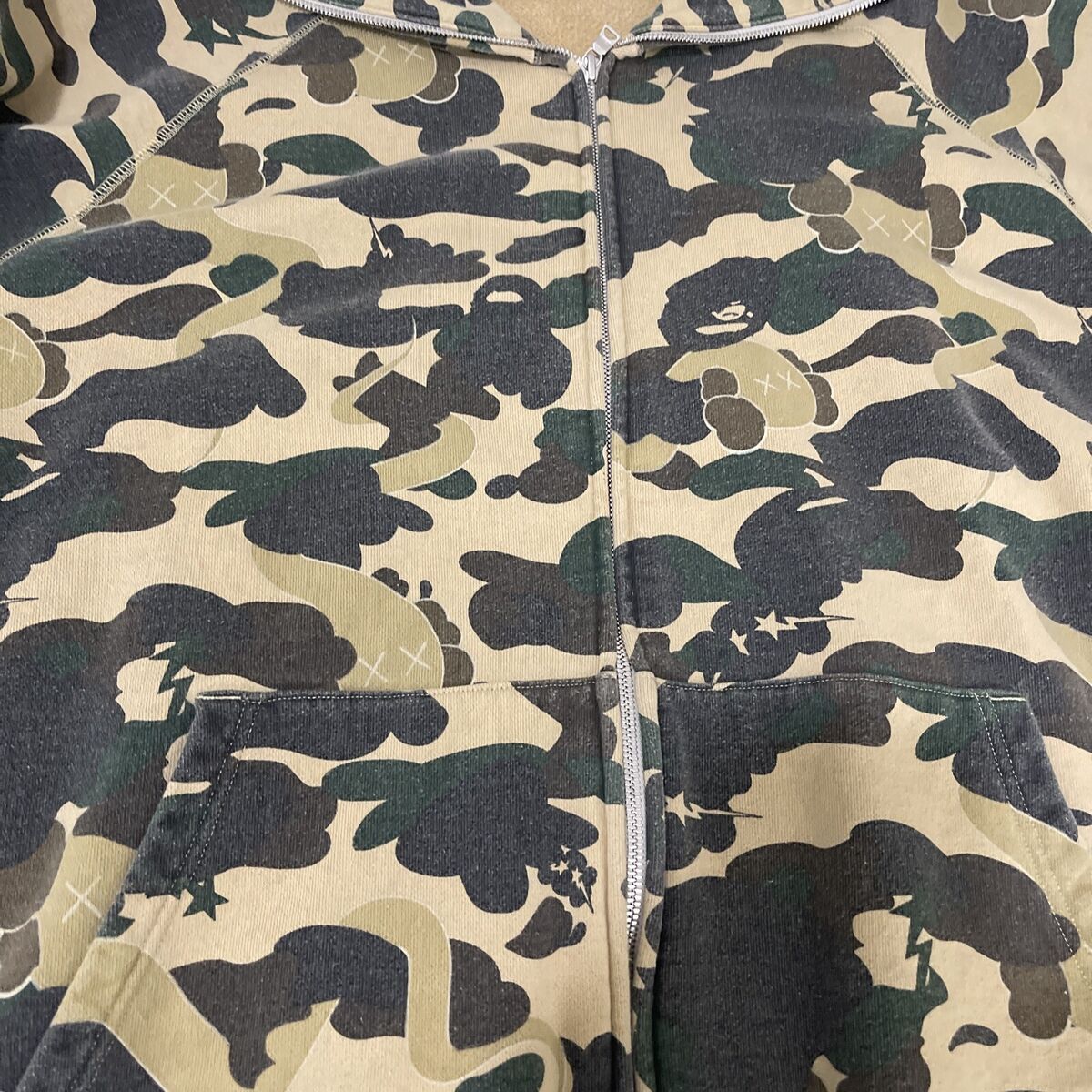 A BATHING APE Ape x KAWS 1st Camo Zip Sweatshirt Hoodie A BATHING APE Ape x KAWS 1st Camo Zip Sweatshirt Hoodie