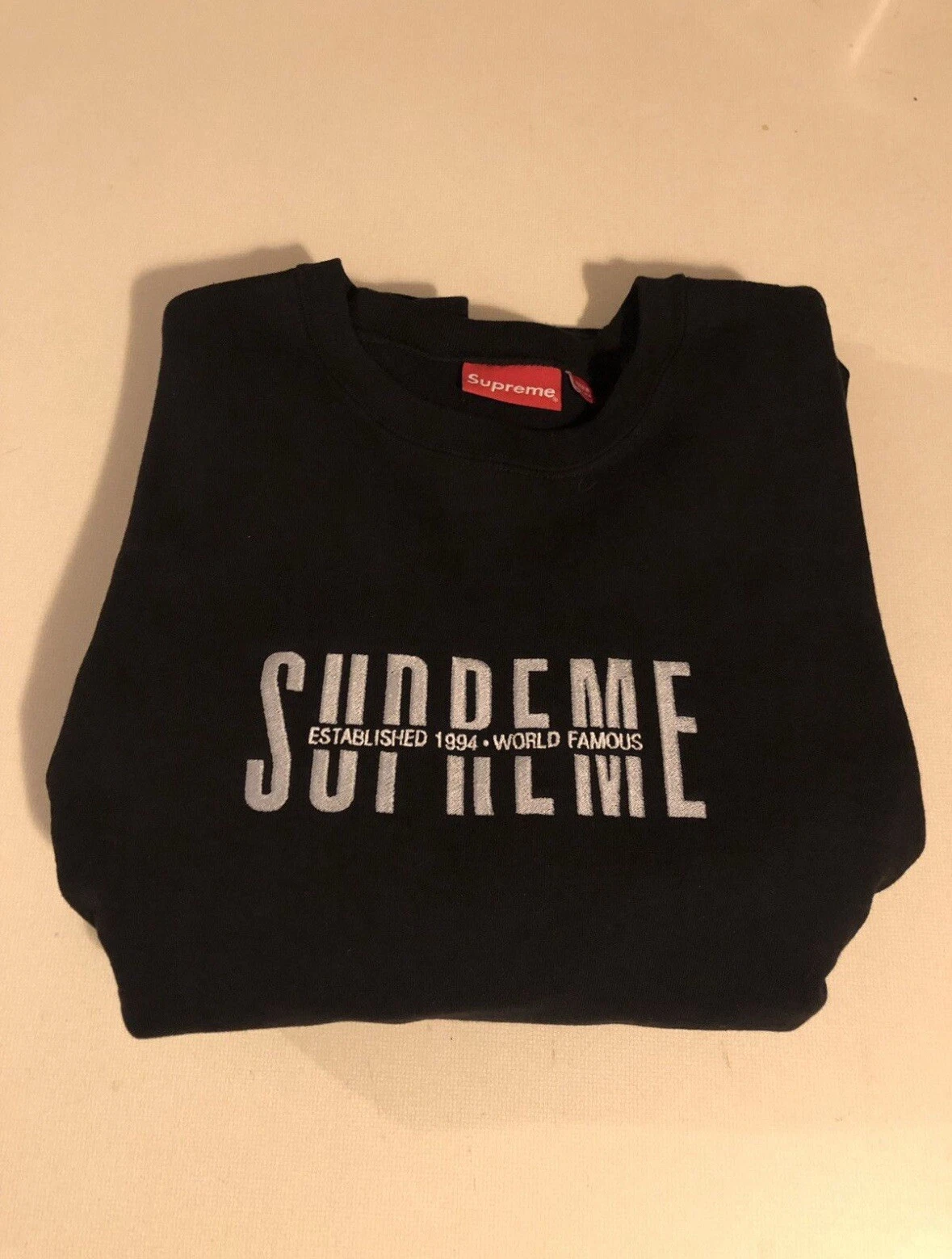 Col rond logo Supreme taille L noir