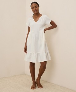 white gauze dresses Memphis Dress: Cloud Handcrafted garments are delicate The Marisol Smocked Gauze Maxi