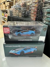 LAMBORGHINI HURACAN STO BLUE WITH EXTRA WHEELS 1/64 DIECAST CAR BY CCA