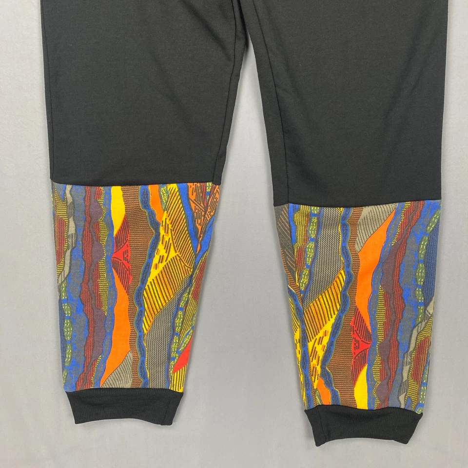Pantalones deportivos Coogi para niños 18 negros con logotipo multicolor bolsillos elásticos en la cintura ligeros Foto 4 de 4
