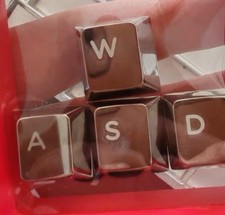 CNC machine out titanium keyboard caps,  the ...