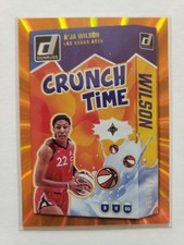 2025 Donruss WNBA A’Ja Wilson #12 Crunch Time Orange Laser #/399 Las Vegas Aces