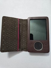 Two 80GB Microsoft Zunes and accessory package, everything you are looking for.