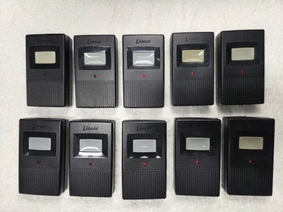 9 used Linear MT-1B 318 MHz  gate/garage opener remote controls