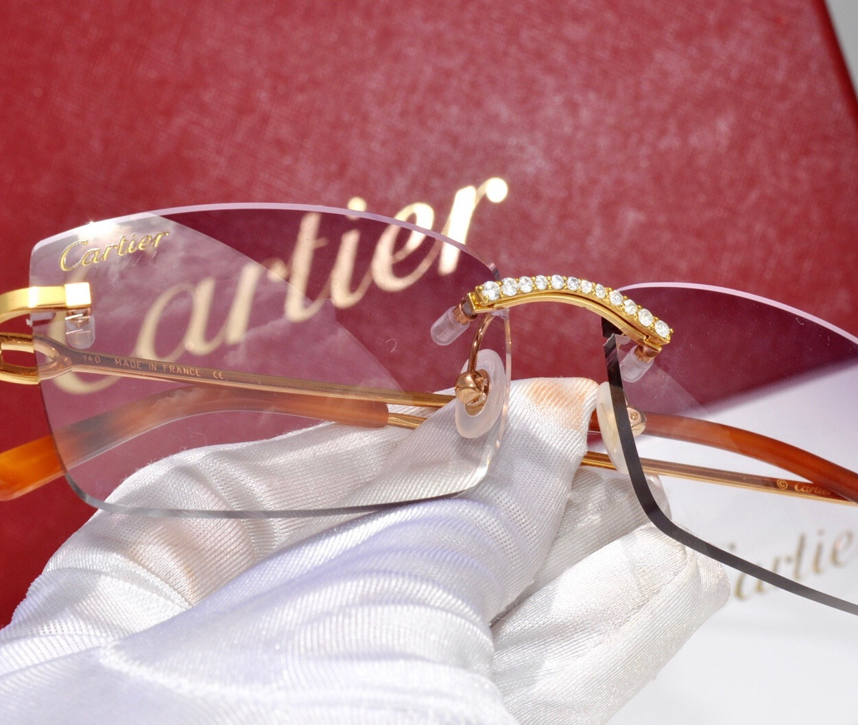 Cartier rimless Diamond nose clip sunglasses glasses C decor Harmattan