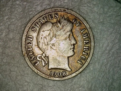 1908-D Barber Dime Silver XF-AU with gold toning and sharp details.