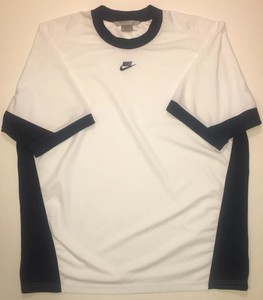 center swoosh nike shirt