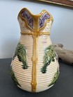 Ceramic majolica pitcher with floral design — photo 4