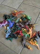 A Large Lot Of Toy Dinosaurs 30+