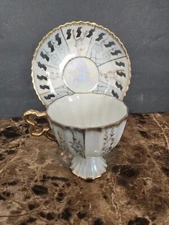 Vintage Gold Detailed Pearlized Luster Footed Porcelain Tea Cup And Saucer 