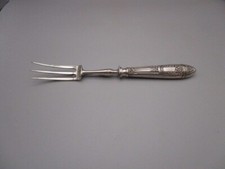 Fourchette de service à viande ancienne en métal argenté et acier
