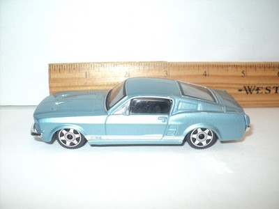 Bburago 1967 Ford Mustang GT Scale 1:43 Light Blue Die-Cast Street Fire Series