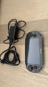 Sony PlayStation Vita Black PCH-1001 With Cable. Lightly Used, Fully Operational