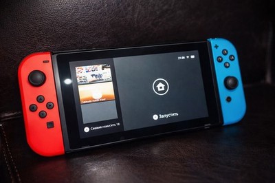Nintendo Switch Handheld Console Red and Blue Joy-Con Controllers, Has Games