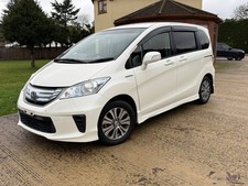 Honda Freed 1.5 Hybrid 7 Seater electric doors pearl white fresh import Ulez