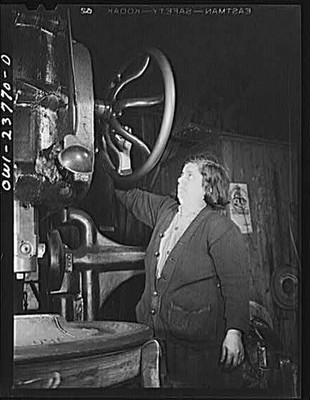 Buffalo, New York. Italian-American woman operating a hand-controlled boring