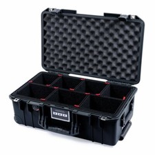 Black Pelican 1535 with Trekpak dividers. Comes with wheels.