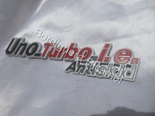 SCRITTA STEMMA LOGO SIGLA TARGHETTA BADGE EMBLEM FIAT UNO TURBO ANTISKID 7650032