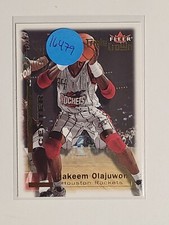 2000-01 Fleer Triple Crown Houston Rockets Basketball Card #213 Hakeem Olajuwon