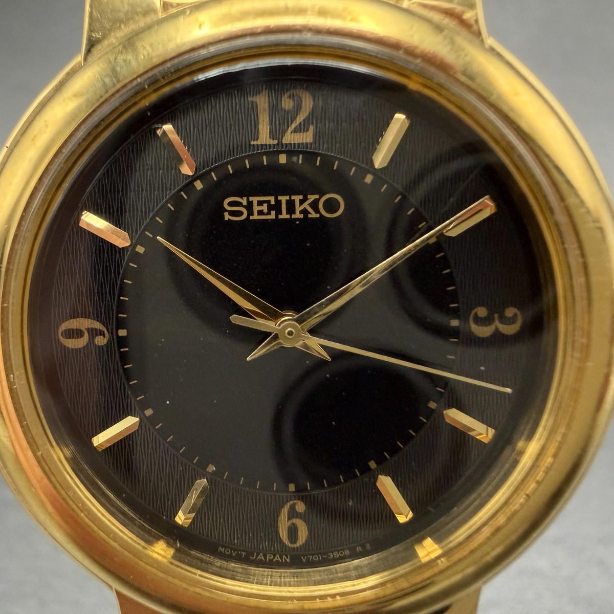 Seiko Watch Men 34mm Black Dial Gold Tone Round V701-2F30 New