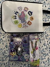 SDCC Comic-con 2023 Exclusive Tamagotchi With lanyard With charm, Pin,and Bag  