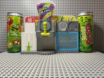 The Grossery Gang Mushy Slushie Maschine mit 73 Super Zings Figuren in 2 Dosen 