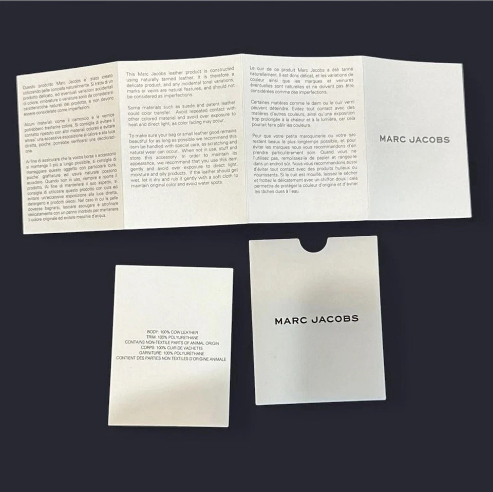 Cartera pulsera Marc Jacob’s negra y dorada Foto 3 de 4