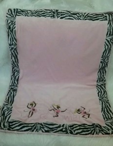 zebra blanket with pink trim