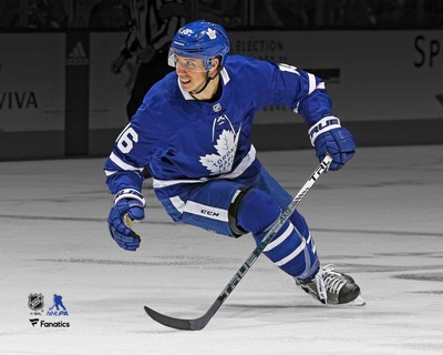 Mitch Marner Toronto Maple Leafs Unsigned Blue Jersey Skating Spotlight Photo