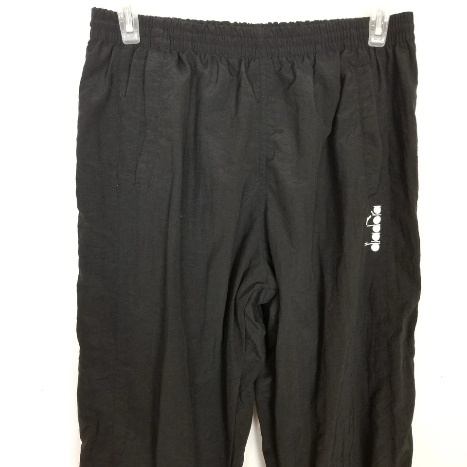 De Colección Diadora Hombres Pantalones Cortavientos Laterales a Presión Talla XL Negro Y2K Cintura Elástica Retro Foto 2 de 4
