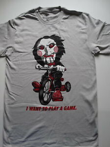 Saw Horror Movie Jigsaw Puppet On Bike I Want To Play A Game T Shirt Ebay - jigsaw from movie saw t shirt roblox