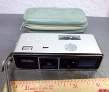 Vintage Minolta 16 model P camera with carry bag, fun collectible older camera