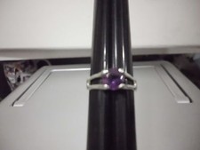 LNC Sz 6.5 AMETHYST SOLITAIRE; SET IN 925 STAMPED STERLING SILVER RING