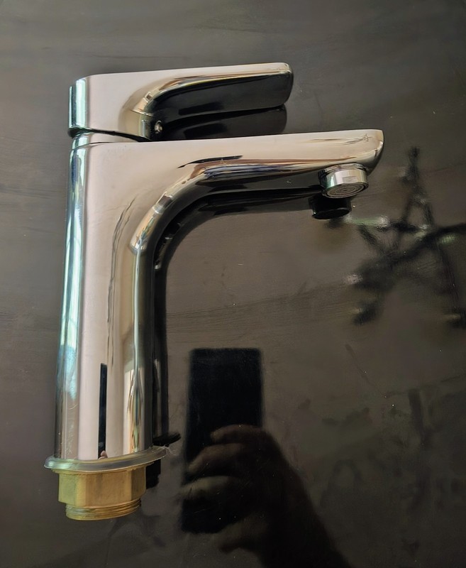 a modern single-lever chrome basin mixer tap,