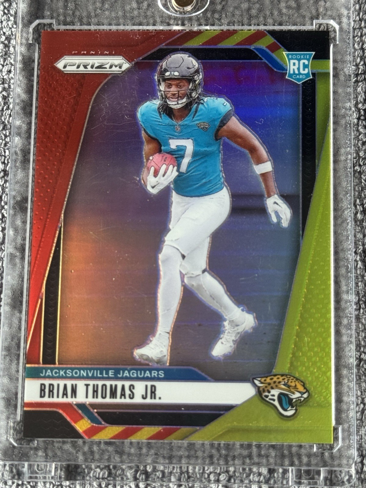 2024 Panini Prizm - Rookies Brian Thomas Jr. #314 Red & Yellow Prizm /44 (RC)