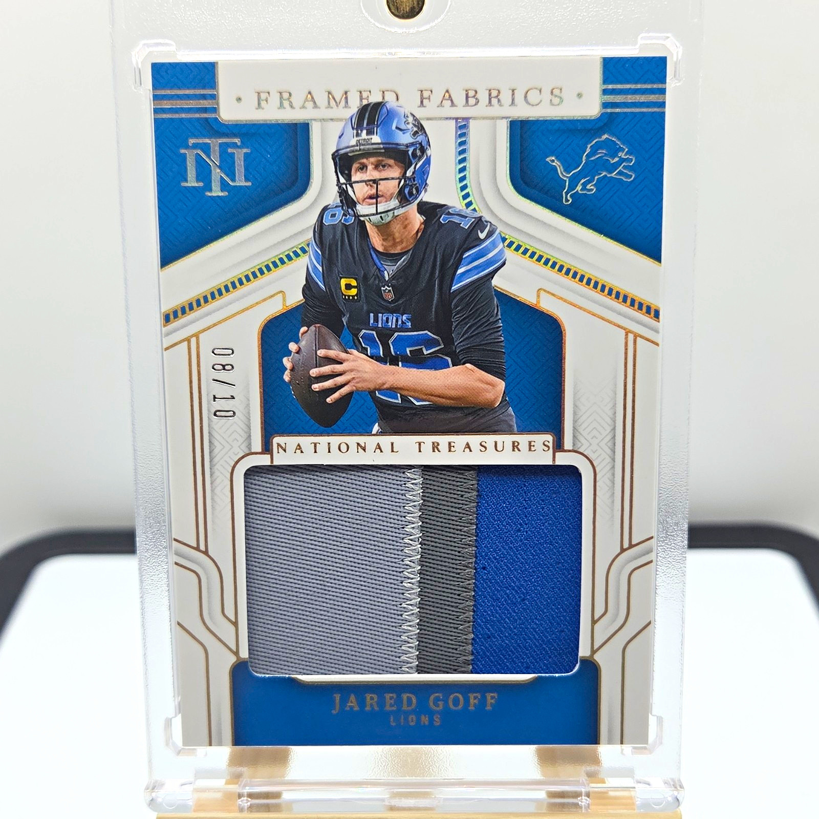 Panini 2024 National Treasures Jared Goff Framed Fabric Holo Gold #FF-JGF /10