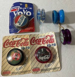Lot of 6 Yo-Yo’s,  1  new Imperial Bottle Cap 2 new Coca-Cola DUNCAN + 3 others