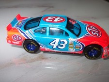 RACING CHAMPIONS 1997 BOBBY HAMILTON STP RICHARD PETTY RACING 1/64 NASCAR