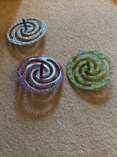 Rare Cosmic Spinner Tops channel Craft From Baby Galileo Not Exact