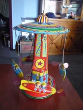 2000 Schylling Collector Series ROCKET RIDE CAROUSEL TIN TOY
