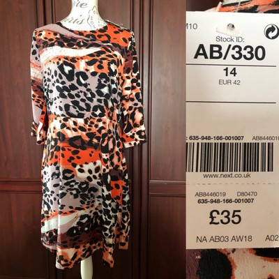orange and black animal print dress