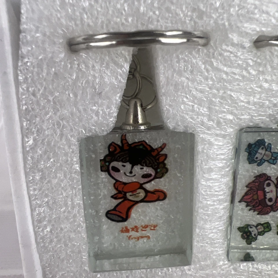 2008 Beijing Olympics Official Mascot Keychain Complete New Set 6 Donghua boxed - Image 2 of 4
