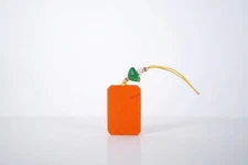 An Inscribed Peking Glass Pendant