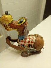 Vtg Flipping Dog tin toy japan wind up. Works