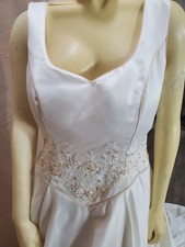 Satin Ivory wedding Gown , embroidered waistline adds refined shape to the Sil